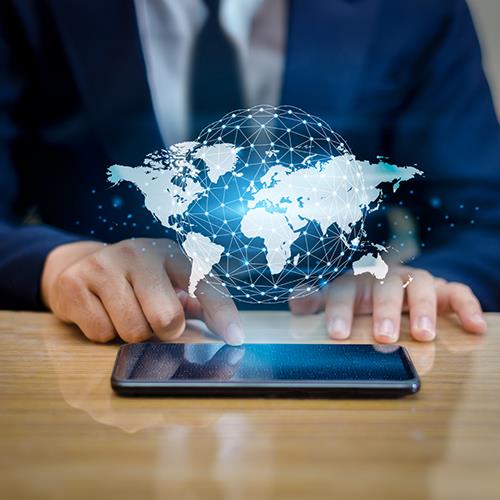 A Businessman Using a Smartphone for International Payments Process