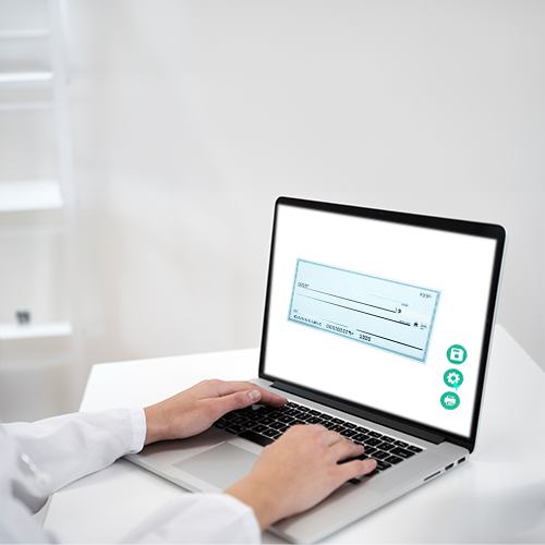 A Woman Is Using a Laptop on a Desk to Check Designer Online