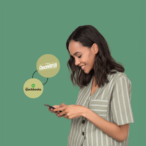 A Person Holding a Smartphone Utilizing Intuit Payments Solutions.