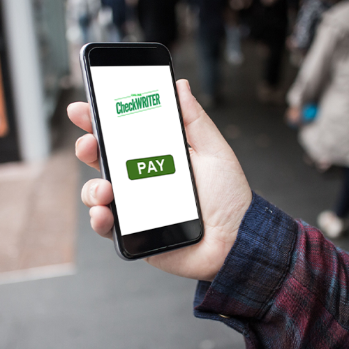 A Person Holding Up a Cell Phone, Engaged in Secure Payment Methods.