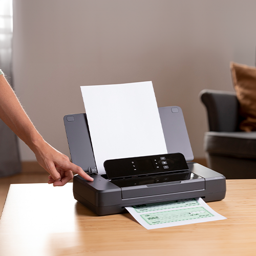 A Person Prints Instant Checks Online