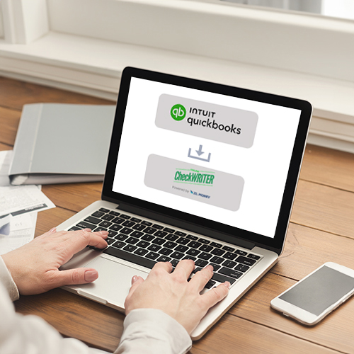 QuickBooks Check Printing Software Create And Customize Easily A Man Working on a Laptop Displays QuickBooks Check Printing Software, He Import Checks for Secure Transaction