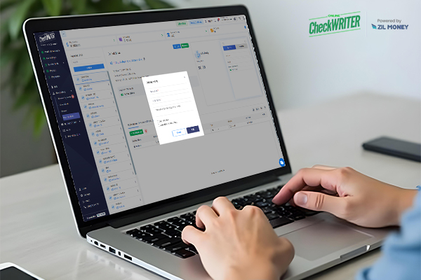 A Person Using a Laptop to Create Payment Links