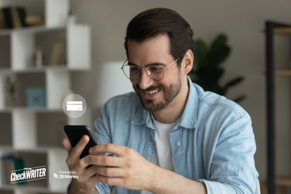 A Man Using A Mobile to Make a Virtual Card Payment. Set Limits and Reduce Overspending—All While Ensuring Enhanced Security and Control