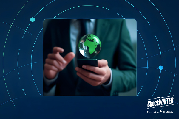A Businessman Uses a Phone with a Glowing Globe, Highlighting an International Payment Solution for Secure Global Transfers.