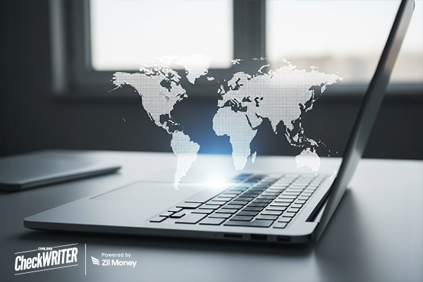 A laptop with a world map graphic showing how businesses can send international payment securely and quickly.
