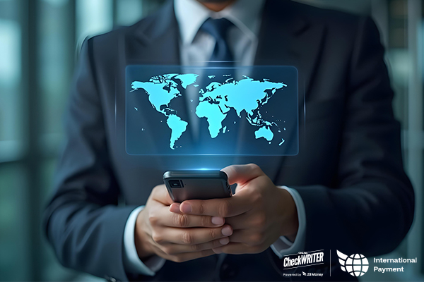 A Man Using A Phone Sends Fast International Payments in Minutes. Enjoy Competitive Exchange Rates, Zero Hidden Fees, and Secure Transfers for Global Payments