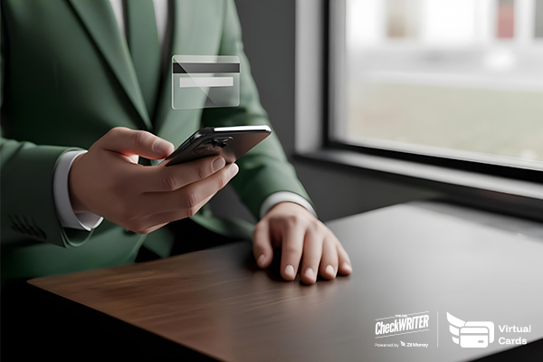 Virtual Card: The Smarter Way for SMBs to Control Spending A Man in a Suit Uses His Phone to Access a Virtual Card for Fast and Secure Business Payments.