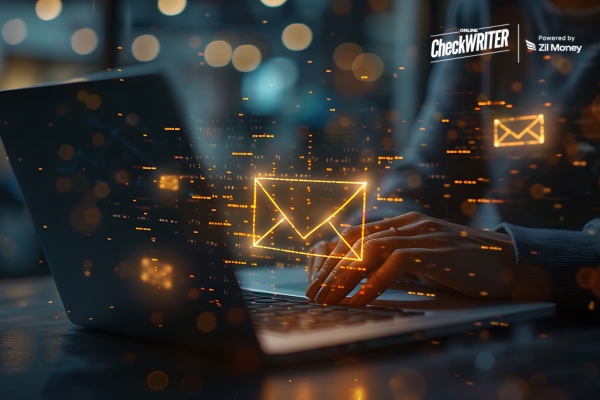 Hands typing on a laptop with a glowing mail icon overhead, symbolizing fast, digital Check Mailing convenience.