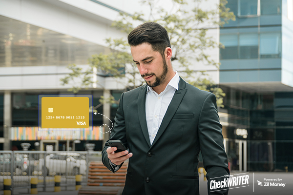 A Person Holding a Smartphome Creating Virtual Cards, 5 Reasons Wallet-Funded Business Cards Are the Smarter Way to Control Team Spending