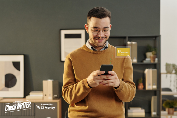 The CFO Advantage How a Wallet Funded Business Card Unlocks Total Expense Mastery for Your SMB Today A Man Holding a Smartphone, The CFO Advantage How a Wallet Funded Business Card Unlocks Total Expense Mastery for Your SMB Today