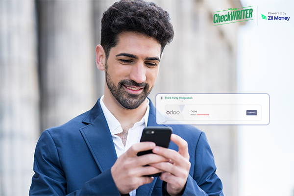 5 Ways Odoo Integration Transforms the Way You Handle Payments A Man In a Suite Holding a Smartphone Showing Odoo Integration. 5 Ways Odoo Integration Transforms the Way You Handle Payments